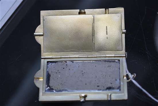 A rare early 20th century sterling silver gilt novelty compact, decorated with an owl on a perch, 11.8cm.